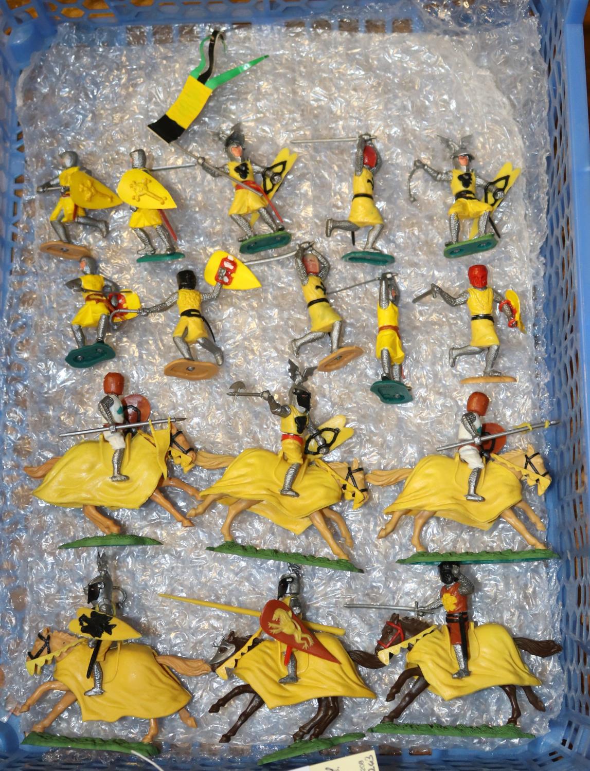 16 Timpo Swoppet knights. 6x mounted knights carrying shields and weaponry primarily yellow or brown