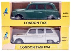 2 Budgie No.703 London FX4 Taxi. A seldom seen example finished in dark green, plus a silver