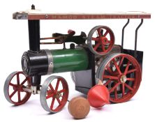 Mamod Traction Engine. With burner, funnel and steering rod. Finished in green with black smoke-