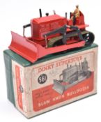 Dinky Supertoys Blaw Knox Bulldozer (561). In red with black wheels and dark green rubber tracks.