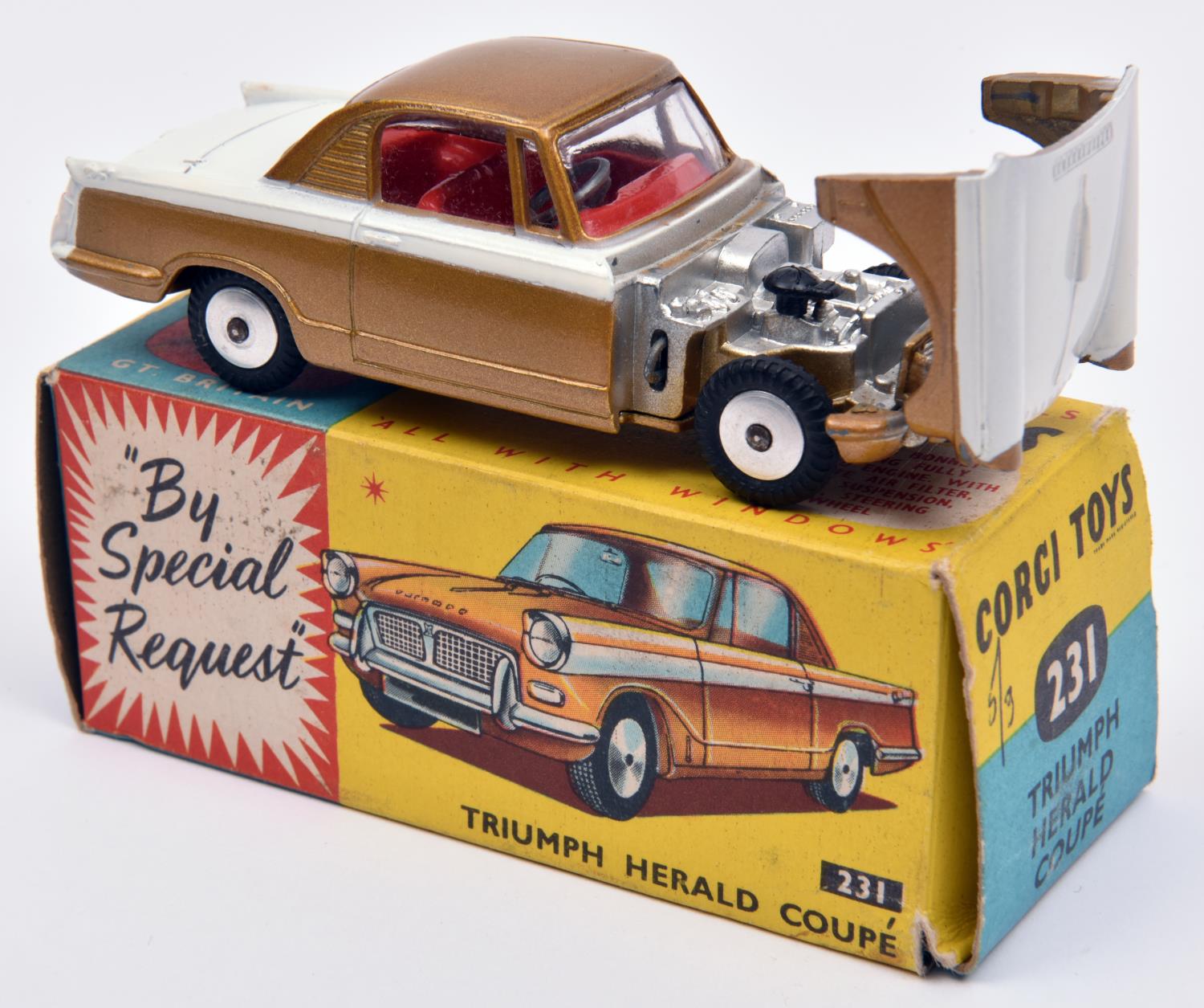 Corgi Toys Triumph Herald Coupe (231). In white and metallic gold with red interior, smooth wheels