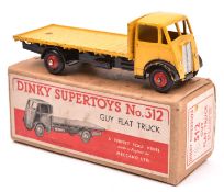 Dinky Toys Guy Flat Truck (512). In yellow with black chassis and red wheels. Boxed, minor wear.
