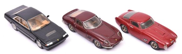3 white metal Ferrari road cars by various manufacturers. An F.Laplace 250MM Scaglietti 1957. In red