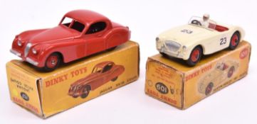 2 Dinky Toys. Jaguar XK120 Coupe (157). An example in bright red with red wheels. Plus an Austin-