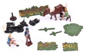 A Crescent Farm Models 'Milking Time' set. Comprising standing cow, sitting cow, sitting calf,