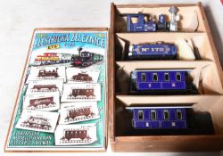 An O gauge American outline train set by ETS Praha for 3 rail running. Comprising a Baldwin 2-6-0