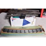 A quantity of Hornby O gauge 3-rail track sections. Including; 2x scarce and early boxes of Hornby