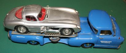 Two fine CMC vehicles. A Mercedes-Benz Renn-Transporter 1954. In blue with silver deck. Together