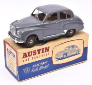 A Victory Industries 1:18 scale battery operated model of an Austin A40 Somerset. Moulded plastic