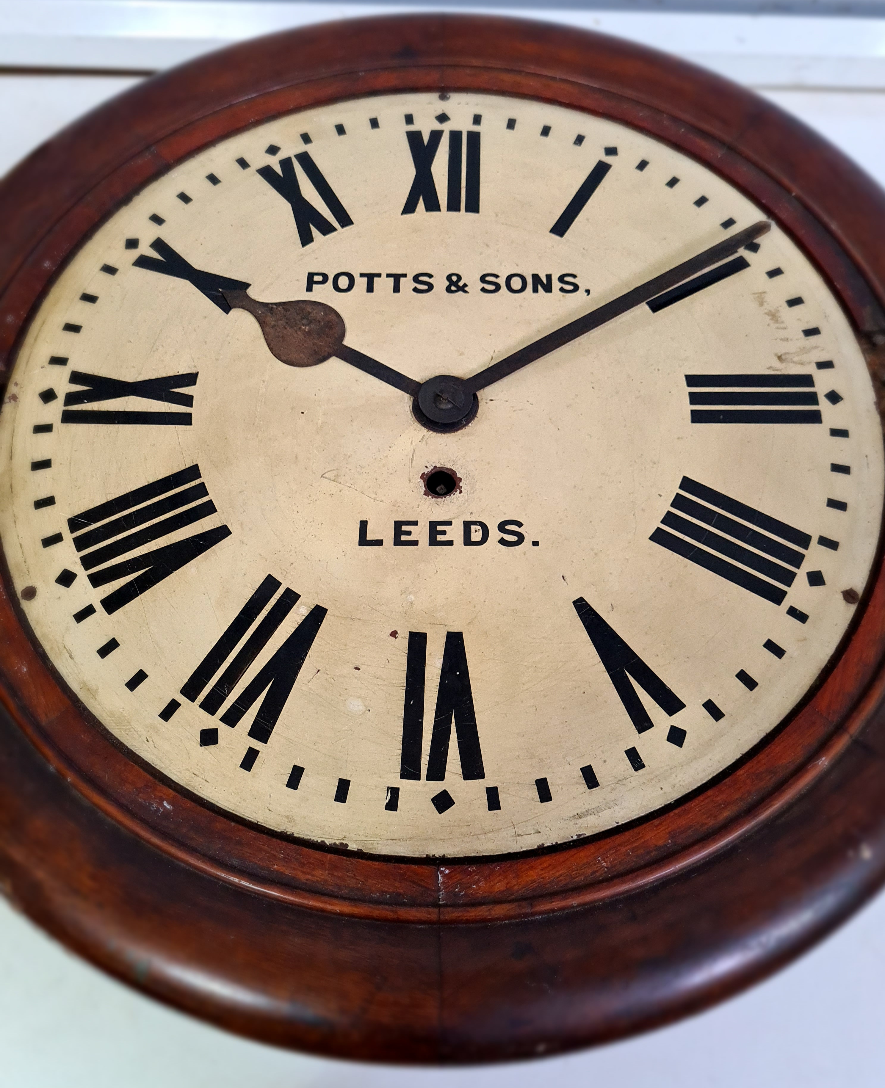 A late Victorian oak wall clock, the 16" dial painted with Roman numerals and signed Potts & Sons - Image 12 of 12