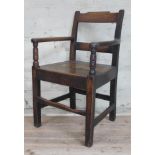 A Georgian oak armchair of small proportions, width 49.5cm, depth 48cm & height 82cm.