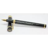 A Cartier Pasha rolling ball ballpoint pen.