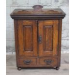 An oak desk top stationary cabinet circa 1900, height 50cm.