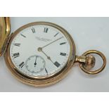 A 1904 gold plated Waltham Traveller full hunter pocket watch having white enamel dial signed '