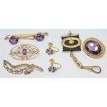 A mixed lot of jewellery comprising three brooches and a pair of earrings marked 9ct gross wt. 12.