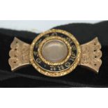 A Victorian yellow metal mourning bracelet, length 46mm, gross wt. 9.71g, with later velvet ribbon.