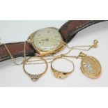 A mixed lot of hallmarked 9ct gold comprising two rings, a pendant locket on chain and a wristwatch,