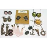 A mixed lot of silver and white metal jewellery, mainly earrings with various stone settings,