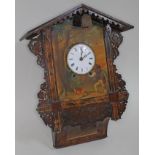 A 19th century Black Forest walnut cuckoo clock, chalet style case with fretwork, 4 1/4" dial