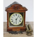 A continental 19th century wag on the wall cuckoo clock, height 30.5cm, with brass cased weights and