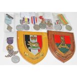 A box of British military medals & two plaques.