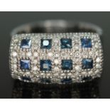 A diamond and sapphire cluster ring, indistinctly marked, gross wt. 10.15g, size P.