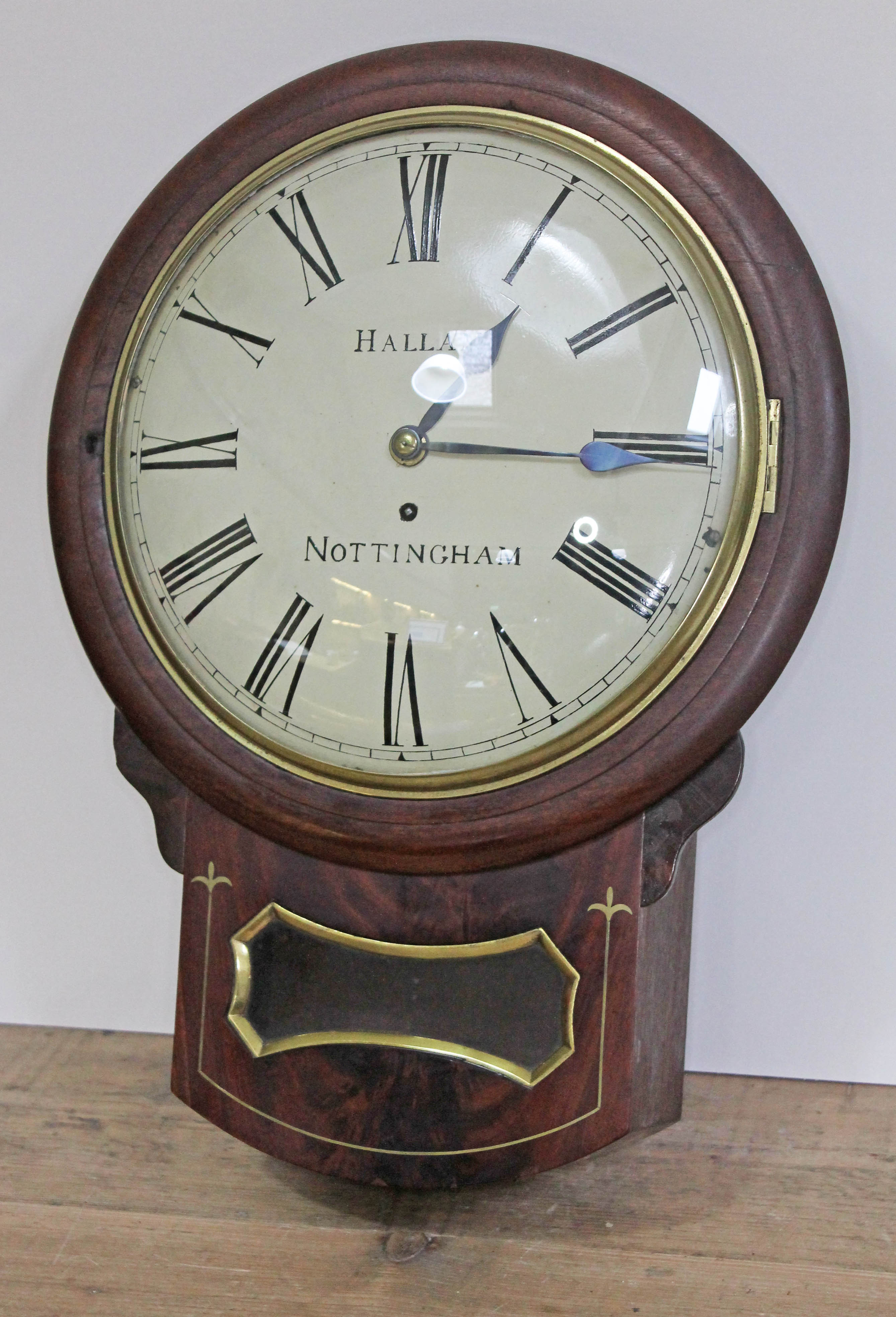 A 19th century brass inlaid mahogany drop dial wall clock, 12" convex dial with painted Roman