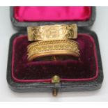 An Edwardian hallmarked 9ct gold scarf clip and another unmarked fitted in case, gross wt. 7.98g.