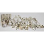 A mixed lot of hallmarked silver comprising various spoons, a pair of pepper pots and a box, gross