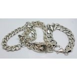 Three heavy link bracelets marked 925, wt. 9oz.