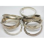 A group of seven hallmarked silver bangles, wt. 4oz.