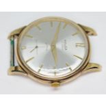 A 1960s hallmarked 9ct gold Majex wristwatch with signed champagne dial, gold tone hour batons and