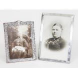 Two hallmarked silver photograph frames, 12cm x 16cm and 13cm x 19.5cm.