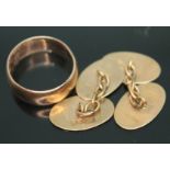 Hallmarked 9ct gold comprising a pair of cufflinks and a wedding band, gross wt. 8.85g.