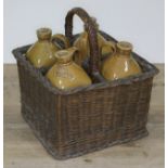 A set of four Victorian stoneware spirit bottles stamped SCOTCH WHISKEY, GIN, IRISH WHISKEY and