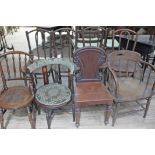 A group of eight assorted chairs including four bentwood, a captain's type spindle back, an