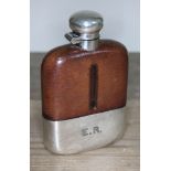 A silver plated and leather bound hip flask with bayonet fitting, makers stamp 'Despatch',