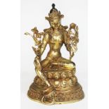 A Tibetan gilt bronze buddha, height 21cm.