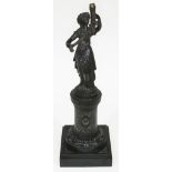 A Bronze lamp base depicting a classical woman holding a cornucopia and stood on a column with
