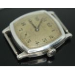 A 1920s Omega wristwatch in hallmarked silver case having double signed dial for retailer Samuel