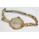 A hallmarked 9ct gold Grand Prix Election 15 jewel manual wind ladies wristwatch with rolled gold