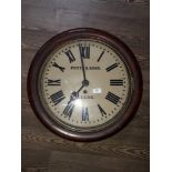 A late Victorian oak wall clock, the 16" dial painted with Roman numerals and signed Potts & Sons