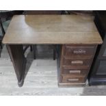 An early 20th century oak desk of small proportions, width 81cm, depth 46.5cm & height 68.5cm.