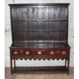 A George III and later oak dresser, width 156cm, depth 44cm & height 185cm.