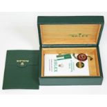 A 1980s Rolex watch box with certificate.