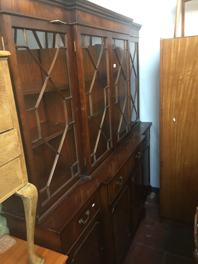 A reproduction mahogany breakfront cabinet bookcase with secretaire drawer Live bidding available