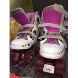 A pair of ladies roller boots UK size 4 Live bidding available via our website, if you require P&P