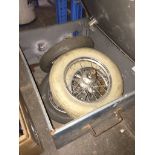 A metal box containing pram wheels. Live bidding available via our website, if you require P&P