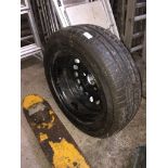 A car wheel and tyre 185/60 R50 Live bidding available via our website, if you require P&P please