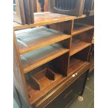 A teak cabinet and a magazine rack Live bidding available via our website, if you require P&P please